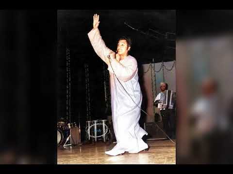 Asha chilo valobasha chilo- Live by Kishore Kumar