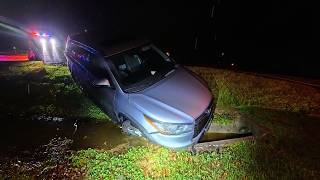 Slick Roads Take Toyota Highlander DOWN Into the Ditch!