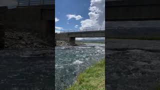 Soothing River Serenity: Blue Sky and Flowing Waters #soothingriver #serenescenery #natureharmony