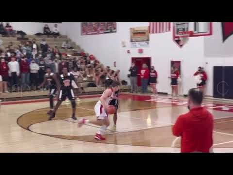 Jacob Martin (Omaha South Packers) hits a nice half court shot at the buzzer!