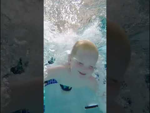 Baby Trying to Dive into the Pool