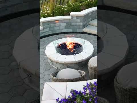 Elegant Raised Pool Deck with Fire Pit