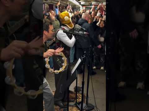 Bad Bunny (and Jimmy Fallon) had a surprise performance in a NYC subway at Rockefeller Center.