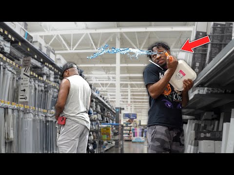 Spraying Strangers With Water Gun!