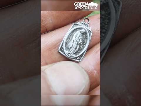 A beautiful silver pendant found metal detecting