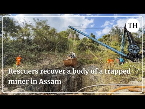 Assam coal mine tragedy:  Rescuers recover a body of a trapped miner