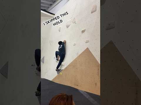 Beta break on a competition boulder