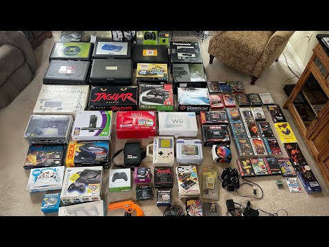 Huge video game lot of rare boxed consoles and blockbuster rental cases! Sega cd nomad 3do and more