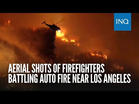 Aerial shots of firefighters battling Auto Fire near Los Angeles