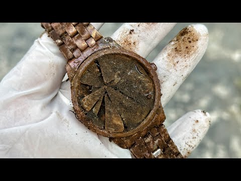 Full restoration of a rusty old Longines watch is meticulously done