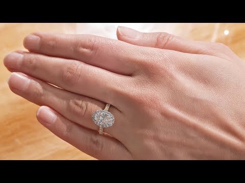 Adorn: Oval Diamond Halo Ring with Diamond Set Band | The Village Goldsmith