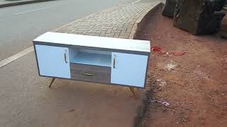 A simple tv stand made out of MDF board. Call or WhatsApp us on 0756148341 for more about furniture.