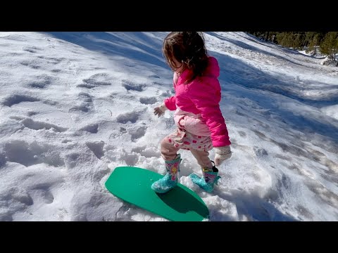 Taking our little sister to the Snow for the first time