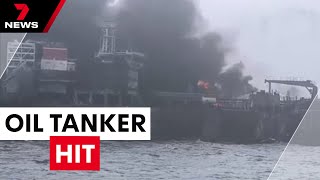 Tanker and cargo ship in fiery collision, triggering explosions and fuel leak | 7NEWS