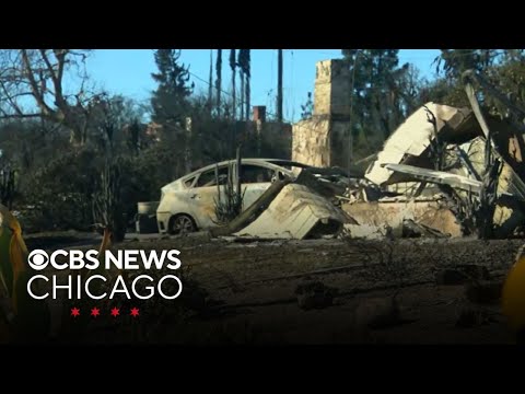 California firefighters work to hold fire lines against high wind threat