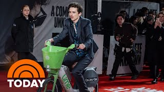 Timothée Chalamet rides Lime e-bike to Bob Dylan biopic premiere