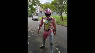 a women turns into a pink power ranger mighty morphin#youtubeshorts#viralvideo#pixverseai