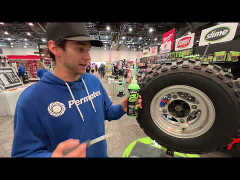 Dylan Hughes demonstrates Slime's 2-in-1 Tire & Tube Sealant