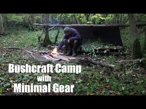 Bushcraft Camp with Minimal Kit. Swiss Army knife. Poncho Shelter.  Raised Bed.  Mors Kochanski.