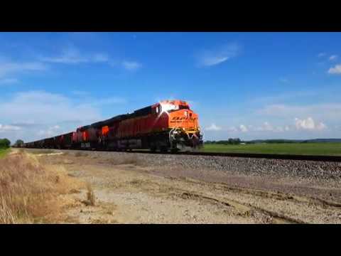 BNSF coal  train led by 6054 and 6271 Gevos, westbound near Pacific Junction, Iowa