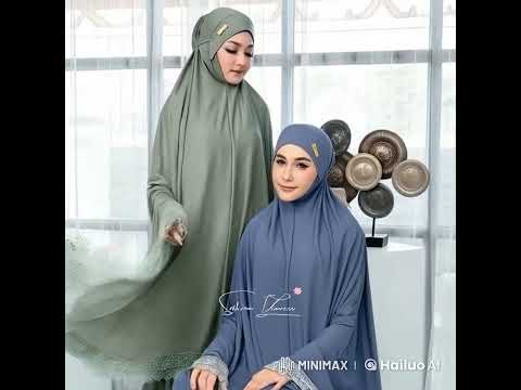 Mukenah dewasa jumbo bahan jersy terdapat logo di bagian kepala