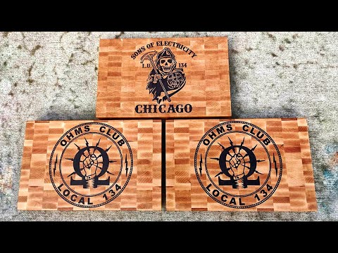 Sons of Electricity cutting board. CNC inlay. The board was made from maple inlaid with walnut.