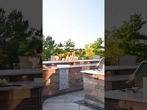 Stunning Outdoor Kitchen with Pool Deck Patio