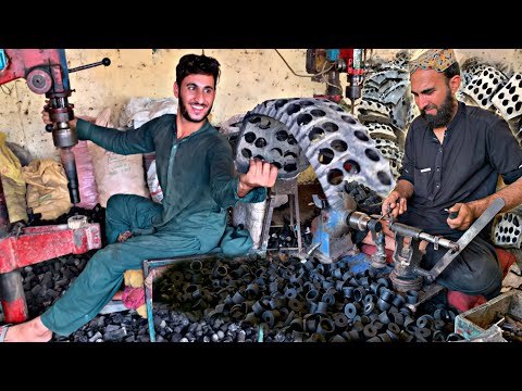 Talented workers retreaded old tires Into Leaf spring Bush