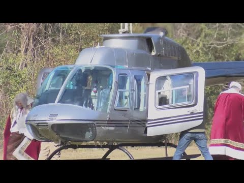 Santa Claus arrives by helicopter to spread Christmas joy to Jefferson County students