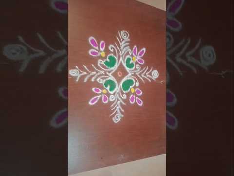 Hand free rangoli design #daily #rangoli #indianart #muggulu #simplerangoli #easy