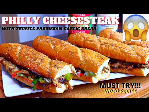 HOW TO MAKE PHILLY CHEESE STEAK WITH TRUFFLE PARMESAN GARLIC BREAD | CHEESESTEAK VIDEO RECIPE