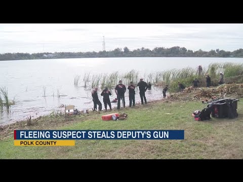 Deputies search Lake Bonnet for deputy's gun allegedly taken and discarded by suspect