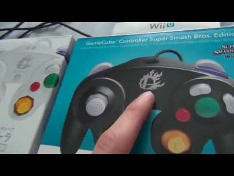 Nintendo Gamecube Controller Adapter and white Smash Bros. Controller