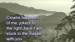 Stealers Wheel ~ Stuck In The Middle With You [LYRICS]