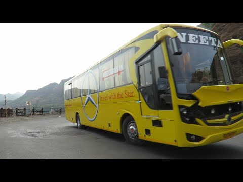 GAGANBAWDA GHAT:YELLOW NEETA BHARAT BENZ BUS DRIVING AT GHAT SECTION BEND ROADS