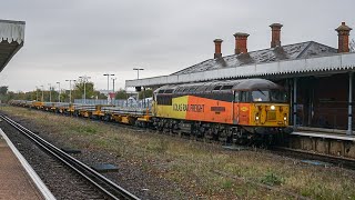 Class 56049 makes a very uncommon appearance on engineering passing through Folkestone West