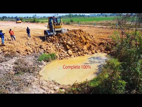 Slow action dozer D65PX pour soil delete pit 1day complete 100% process with heavy dump truck