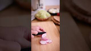 Close up of a Person Cutting a Radish