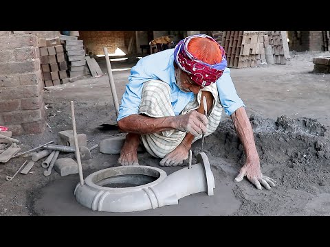 Rural metal foundry where 80Y old man cast metal parts