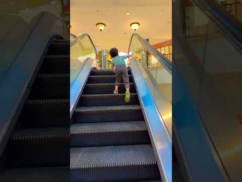 Funny cute kid 👏🚀taking steps on #escalator for robust health😃🤩🤣