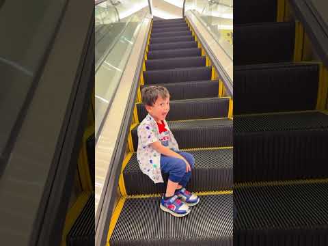 Cutest😍❤️ little explorer bravely climbing the #escalator😜😂