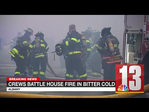 Albany fire crews battle house fire in bitter cold