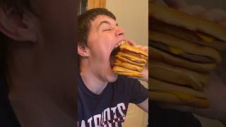 Isaac, the man with the world's biggest mouth, can eat four burgers at once 😲