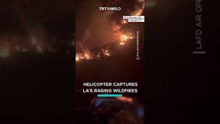 Helicopter captures LA’s raging wildfires