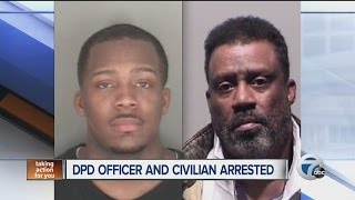 Detroit Police Department officer and civilian arrested