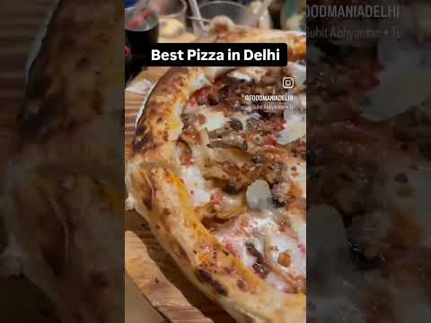 Best Pizza in Delhi at Bomba, Mg Road #shorts #trending #italianfood #deliciousfood #pizza #reels