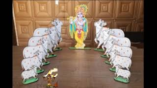 SRI VENUGOPALA KRISHNA STANDING WITH ROW OF COWS AARADHANAI