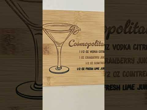 Bamboo garnish cutting board laser engraved with a cosmopolitan drink recipe. #laserengraving