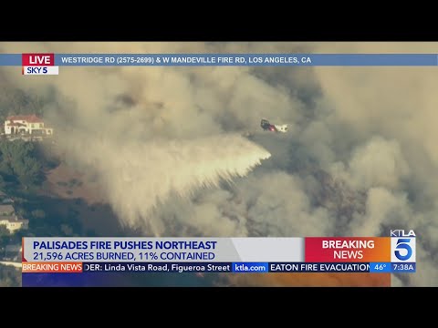 Helicopter makes crucial water drop near Brentwood houses