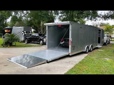 Buying a new enclosed race car trailer. this thing is next level